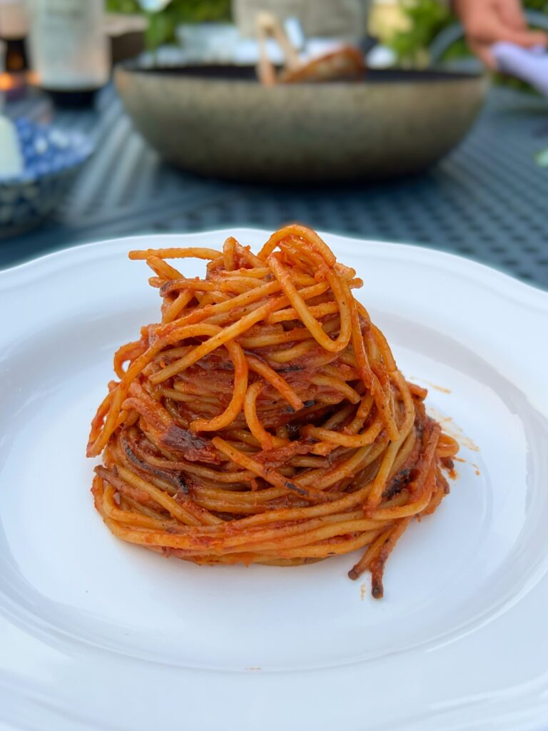 Spaghetti all’assassina from Bari, Puglia. Also known as spaghetti brucati Barese (burnt spaghetti from Bari). Cooked by the Puglia Guys using an authentic assassina recipe.
