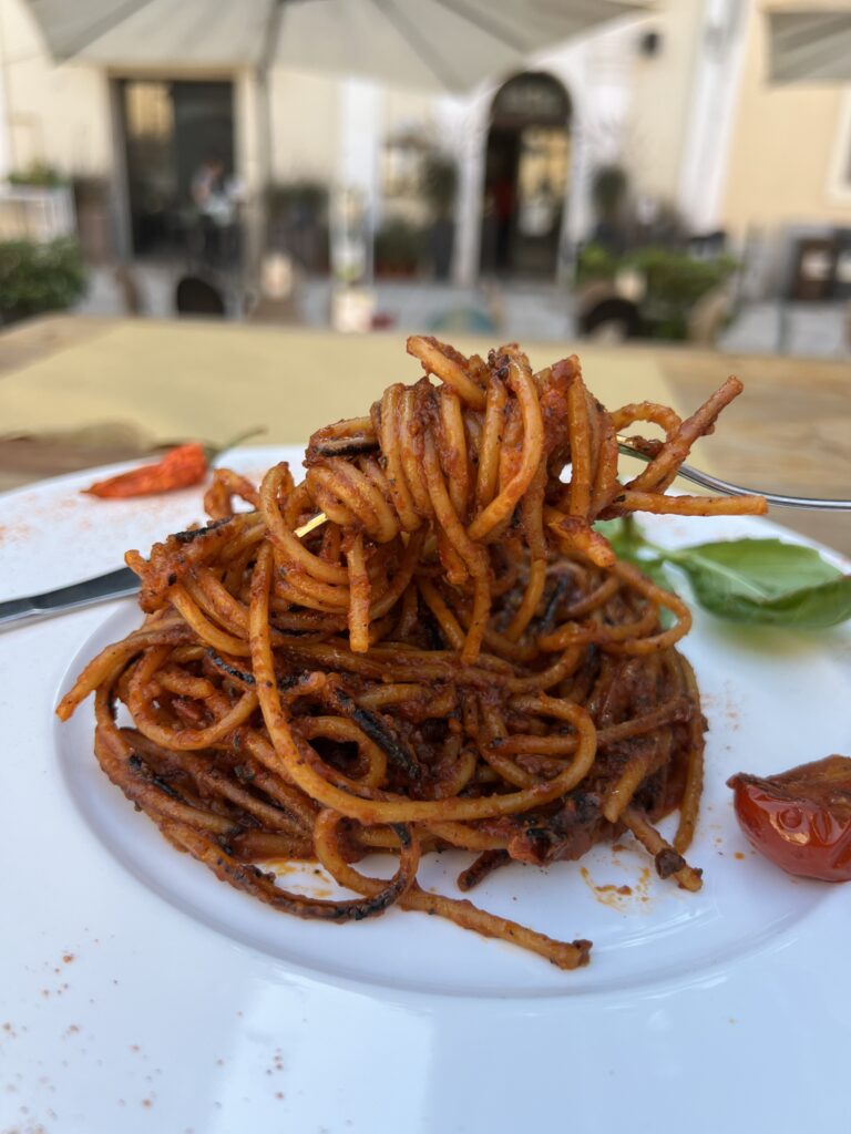 Spaghetti assassina eaten by the Puglia Guys - one of Italy’s top 10 pasta recipes.