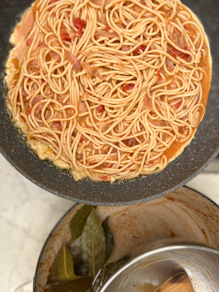 Leftover spaghetti and beaten eggs for Spaghetti frittata recipe from the Puglia Kitchen by the Puglia Guys. 