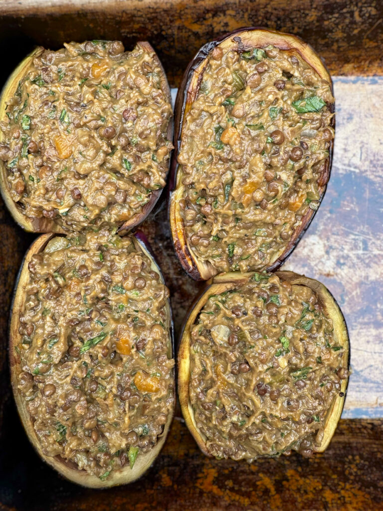 Stuffed aubergine (stuffed eggplants) melanzane ripiene recipe from the Puglia Kitchen by the Puglia Guys.