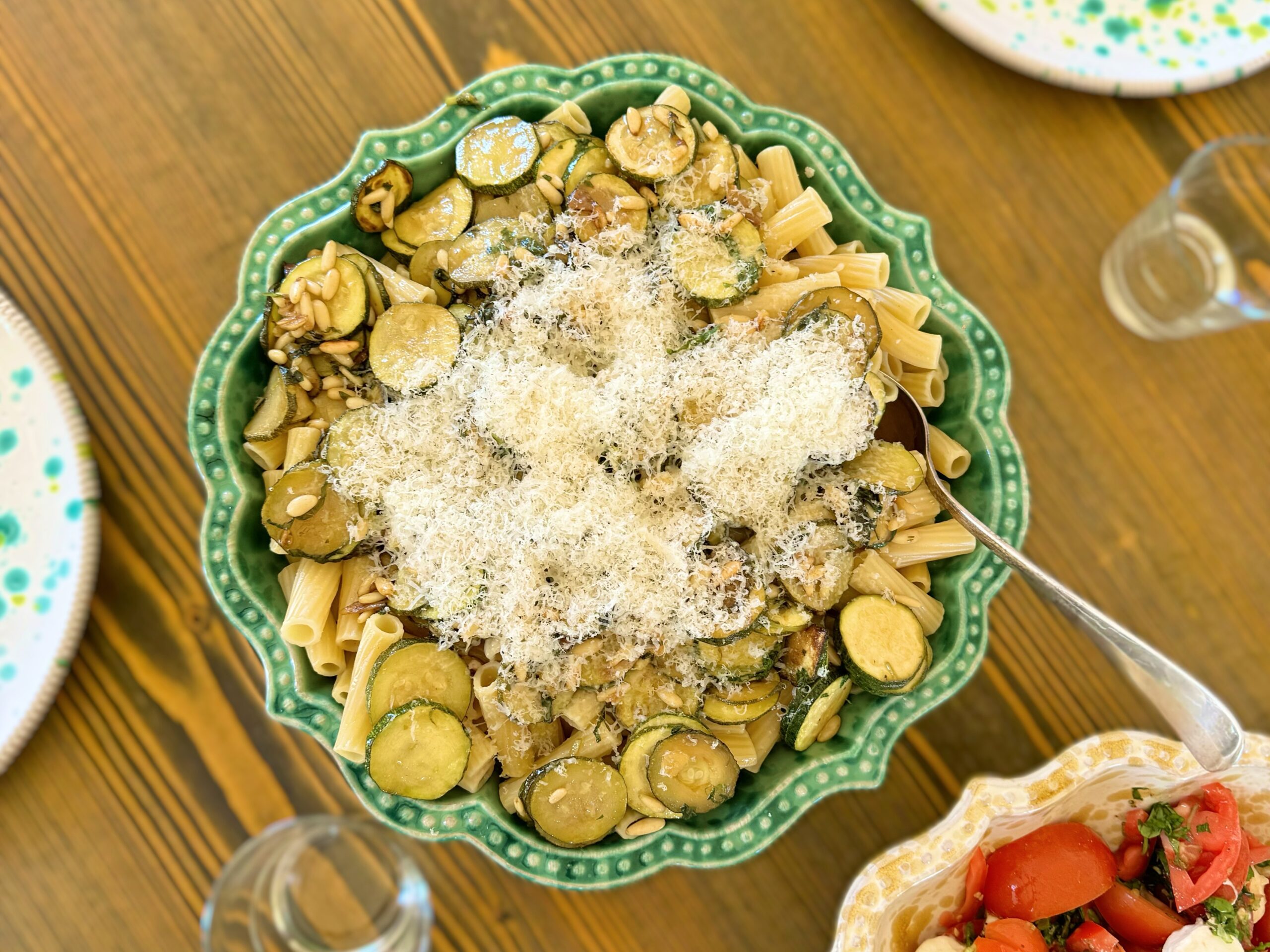 Rigatoni alle zucchine served up in a ceramic bowl in the Puglia Kitchen. Pasta and courgette recipe by the Puglia Guys.