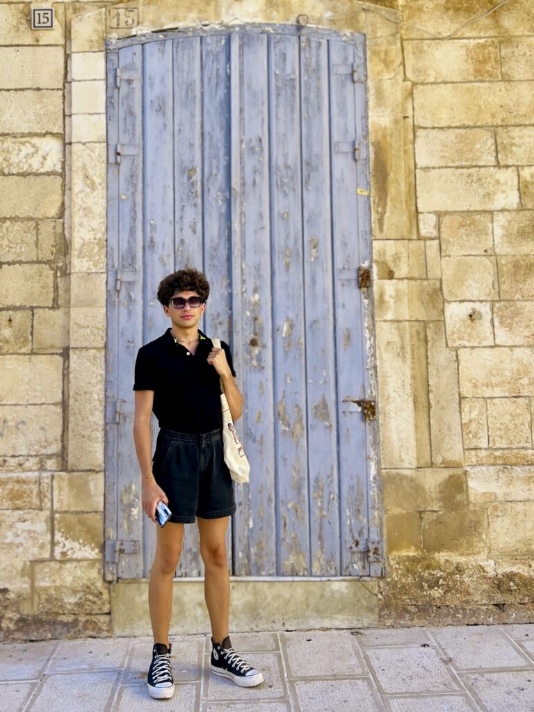 Puglia Guy team member Riccardo stands in front of a door in Martina Franca. From The Puglia Guys Martina Franca Guide.

Martina is a town rich in Baroque elegance, historic charm, and cultural heritage. Walking through its winding streets, visitors encounter stunning churches, grand palaces, and picturesque piazzas, each telling a story of the town’s rich past. Our Puglia Guys Martina Franca guide takes you on a journey through the most remarkable sites, from the Gothic convents to the Baroque splendor of its churches and palazzi, with recommendations for the best local restaurants to complete your experience

Nestled in the picturesque Valle d’Itria, approximately halfway between the Ionian and Adriatic Seas, Martina Franca’s strategic position—which allowed for control over trade and commerce, a key factor in the town’s prosperity—played a crucial role in shaping its past, from ancient settlements to medieval fortifications and Baroque splendour. 

For history lovers, art enthusiasts, and cultural explorers, Martina’s churches offer a glimpse into a time when faith and art were inextricably linked, creating monuments that continue to inspire and captivate.

Today, Martina Franca is a vibrant town, the largest of the Valle d’Itria. Its charm lies in its baroque architecture, splendid churches, the narrow streets of its old town, and 18th-century town houses with Baroque features and wrought-iron balconies. Known for its gastronomy (we recommend some of our favourite restaurants, but in reality there is no need to adhere to it, good food is easy to find) its best known culinary export capocollo di Martina Franca (our favourite regional cured meat).

Photo by the Puglia Guys, Puglia Travel ambassadors. PugliaGuys.com
