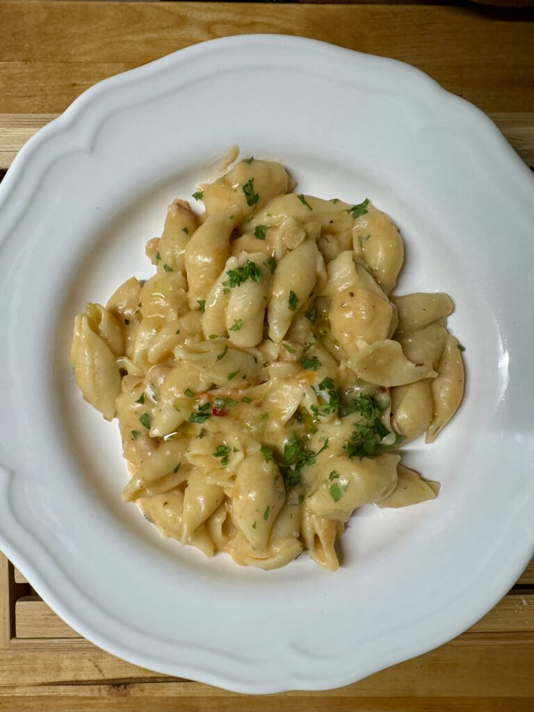 the Puglia Kitchen recipe | Pasta e Fagioli alla Barese.

In Bari, pasta e fagioli is made with a local ingredient that takes it to another level of pleasure: ricotta forte – in Barese dialect, ricotta ascuànt – a store cupboard essential in our Puglia Kitchen. It is a type of fermented ricotta cheese, creamy and with a strong, tangy flavour.

Photo, recipe and cooking by the Puglia Guys, Puglia ambassadors.